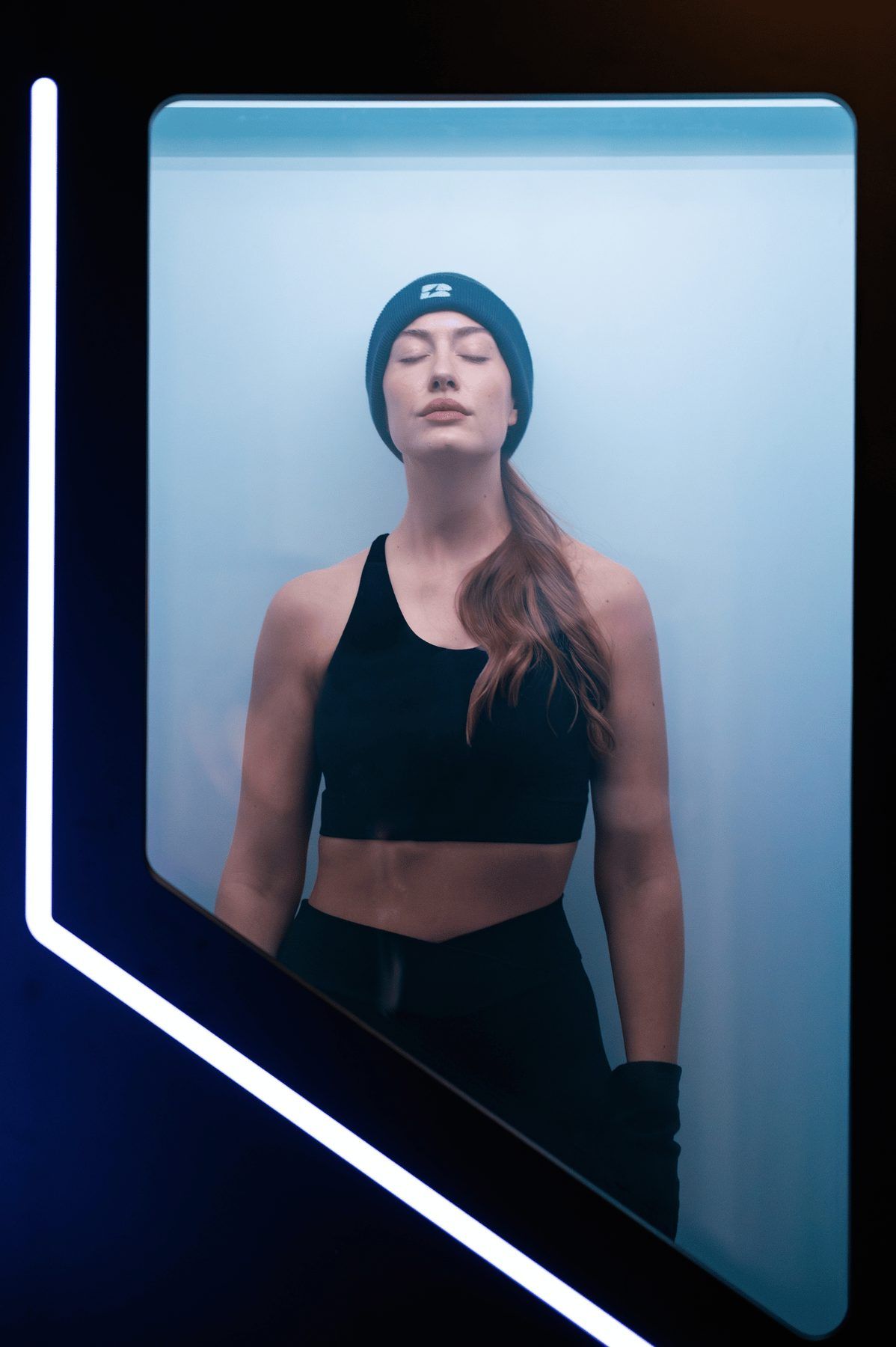 A member in the whole body cryotherapy chamber at Biowell Health in Battersea, London